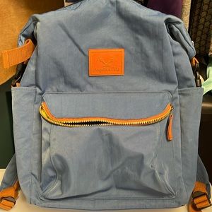 Angelia & Pets Bookbag in EUC outside is dark blue, inside bright green